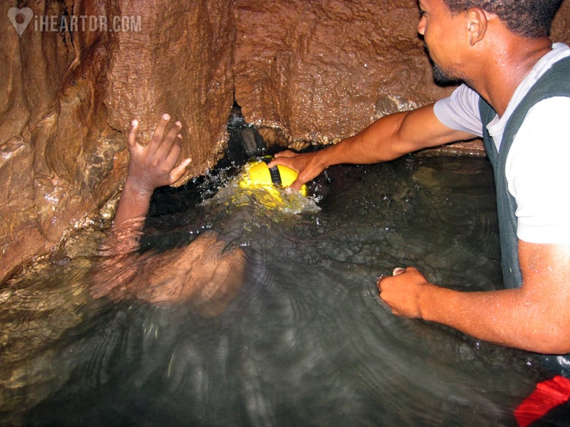 Briefly diving into the underground river to go to the other side of a rock