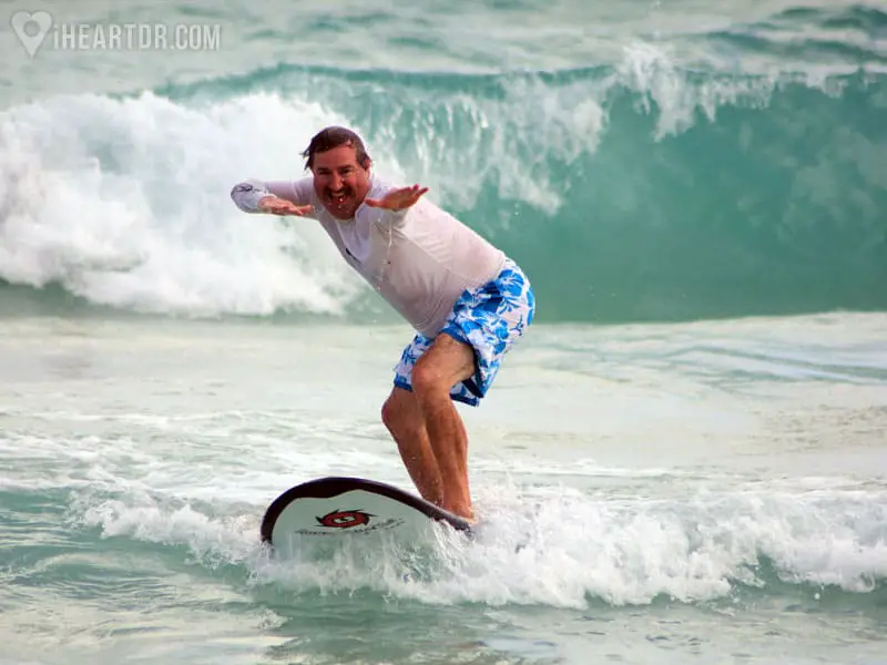 Man enjoying himself while surfing