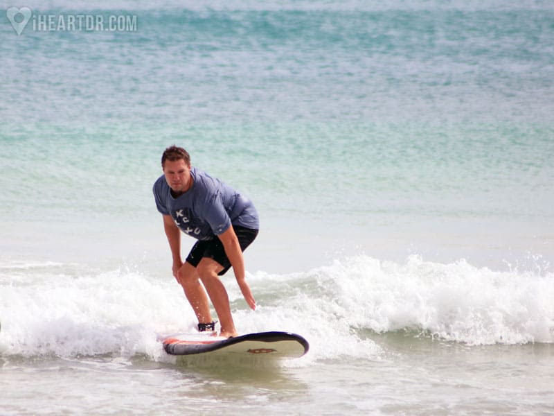 Man riding a small wave