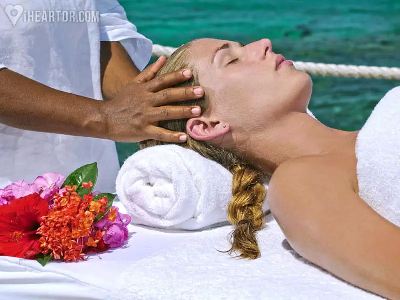 Woman getting a head massage