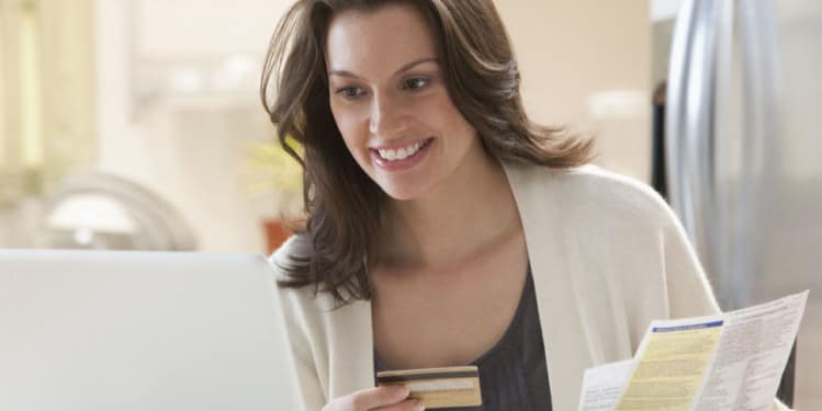 Woman paying with a credit card